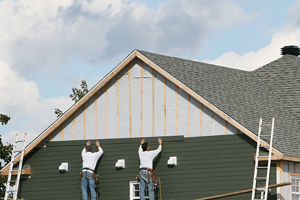 Professional Siding technician working in Easton, MD
